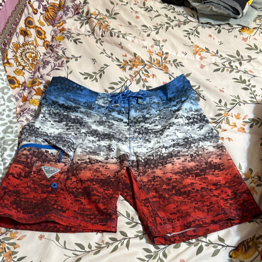 Mens 34/Ins 9 “ Swim trunks